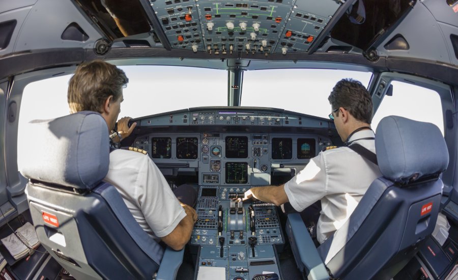 Student pilot receiving cockpit training